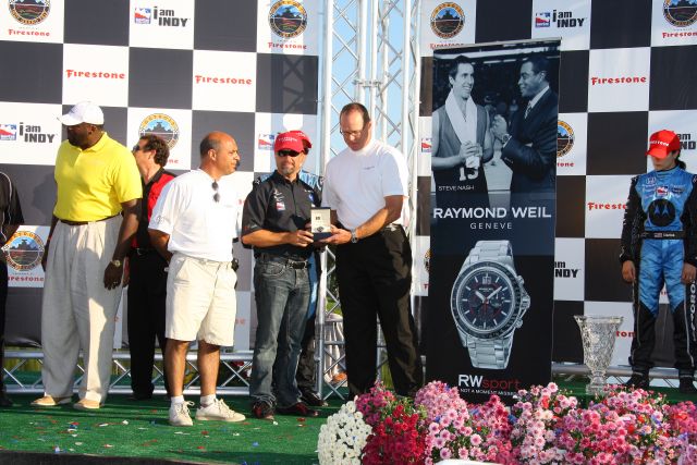 Team owner Michael Andretti is awarded Raymond Weil watch during awards ceremonies. -- Photo by: Shawn Payne