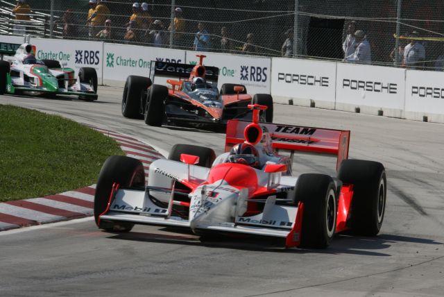 Team Penske driver Helio Castroneves leads the field as AGR drivers Dario Franchitti and Tony Kanaan follow close behind. -- Photo by: Steve Snoddy