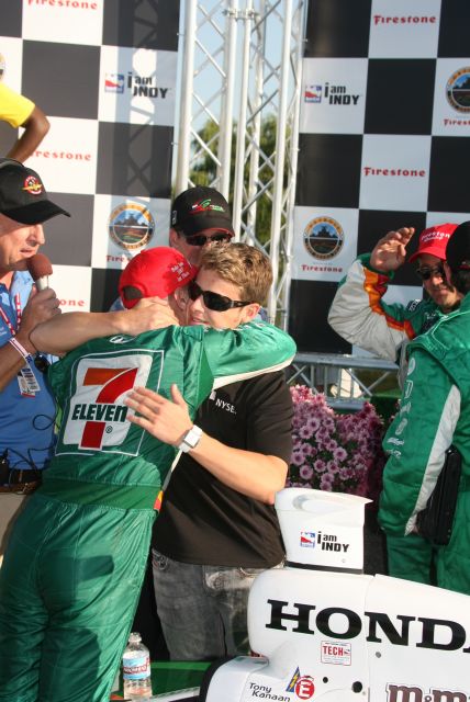 AGR teammate, Marco Andretti, congratulates race winner Tony Kanaan. -- Photo by: Steve Snoddy