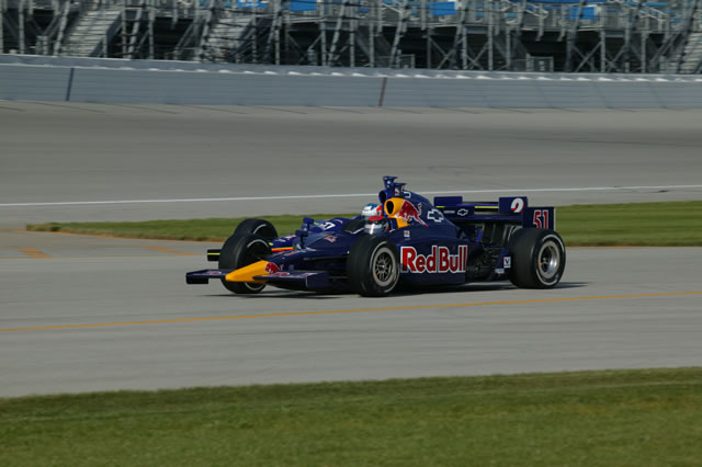#51 Red Bull Cheever Racing driver Alex Barron, & #2 Panther Racing's Townsend Bell exit pit lane -- Photo by: Shawn Payne