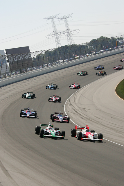 Race action in the turns at Chicagoland Speedway during the Delphi Indy 300. -- Photo by: Ron McQueeney