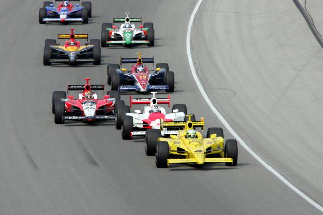 Tomas Scheckter leads the pack during the Peak Antifreeze Indy 300 from Chichagoland Speedway. -- Photo by: Ron McQueeney