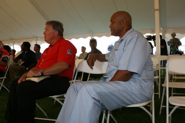 George Foreman sits in with Rev. Bob Hills during the morning service at Chicagoland Speedway -- Photo by: Chris Jones