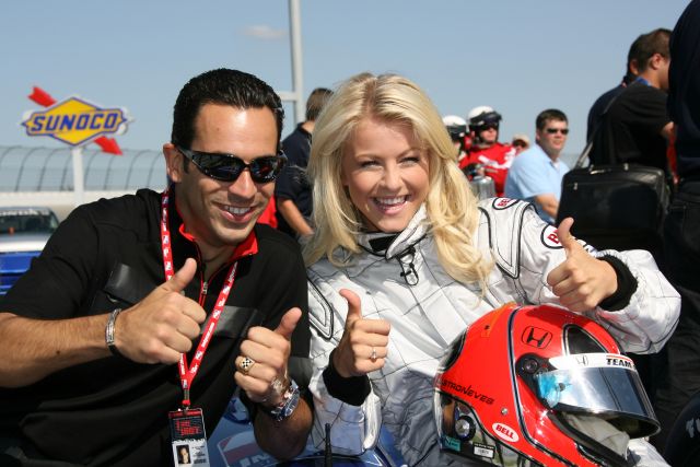 Helio Castroneves and his dancing with the stars partner, Julianne Hough, at Chicagoland Speedway -- Photo by: Chris Jones