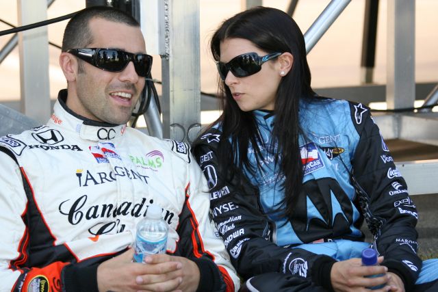 AGR teammates Dario Franchitti and Danica Patrick chat prior to driver introductions. -- Photo by: Chris Jones