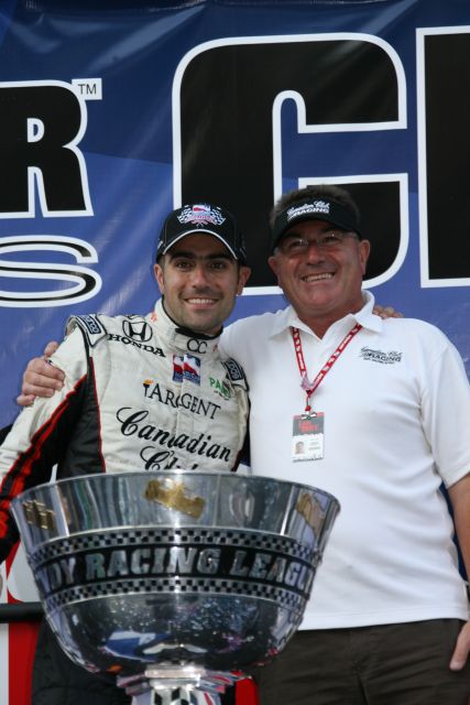 A very proud George Franchitti poses with son , race and series champion Dario Franchitti. -- Photo by: Chris Jones