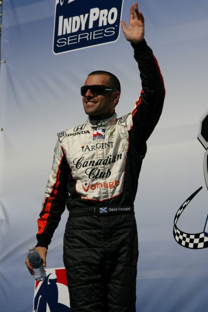 Indy 500 winner and points leader leading into Chicagoland race, AGR driver Dario Franchitti as he waves to crowd during driver introductions. -- Photo by: Dana Garrett