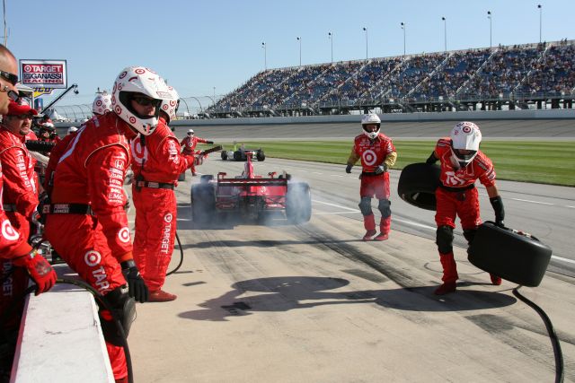 Target Chip Ganassi crew watch as car exits pit lane after routine pit stop. -- Photo by: Dana Garrett