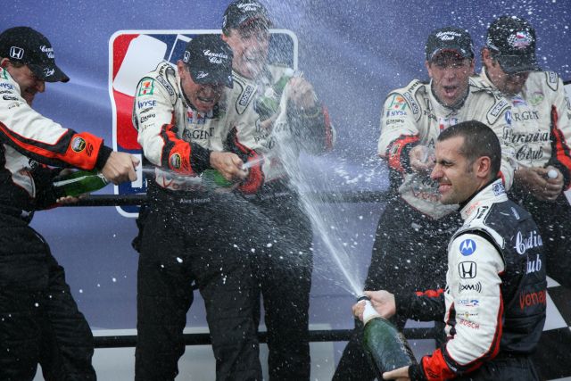 Dario Franchitti and his crew celebrate his Championship win. -- Photo by: Dana Garrett
