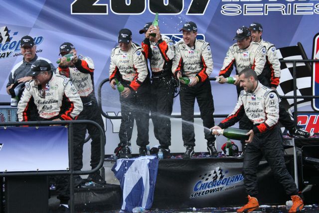 Dario Franchitti and his crew celebrate his Championship win. -- Photo by: Dana Garrett