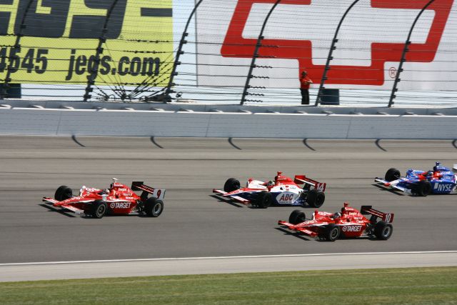 Target Chip Ganassi teammates make their way around Chicagoland Speedway with A.J. Foyt driver Daren Manning and AGR driver Marco Andretti close behind. -- Photo by: Jim Haines