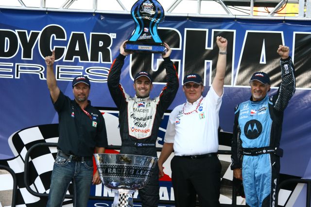 Peak Antifreeze Indy 300 presented by Mr. Clean race winner Dario Franchitti, center, celebrates with team owners. -- Photo by: Jim Haines