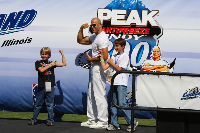 'Mr. Clean' hams it up with young race fans at Chicagoland Speedway. -- Photo by: Shawn Payne
