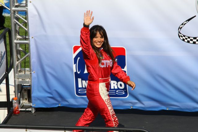 Milka Duno waves to crowd upon driver introductions. -- Photo by: Shawn Payne