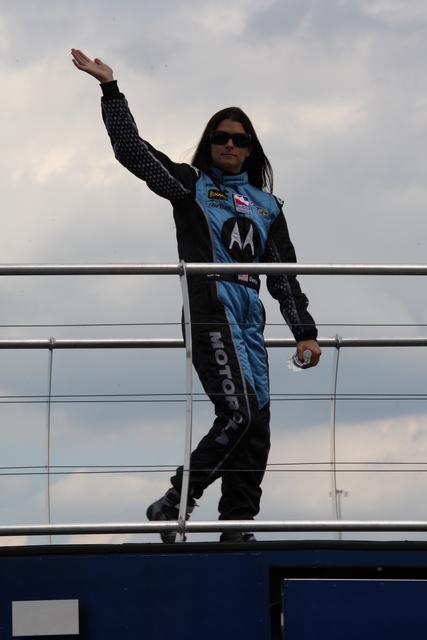 AGR driver #7 Danica Patrick makes her way onstage during driver introductions. -- Photo by: Dana Garrett