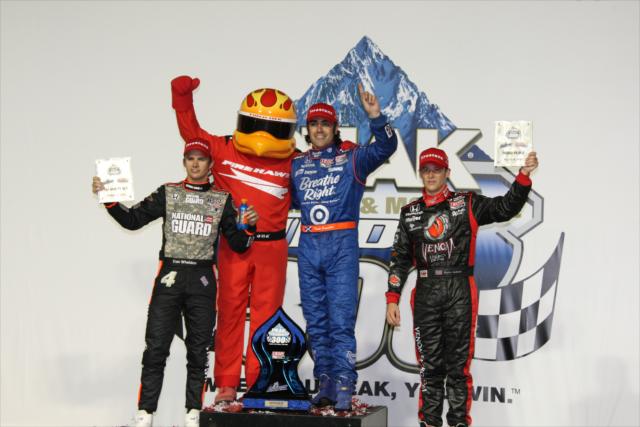 Wheldon, Franchitti, Andretti on the podium -- Photo by: Jim Haines
