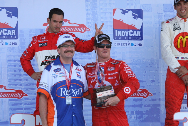 Helio Castroneves has fun at Scott Dixon's expense following Dixon's win at Edmonton. -- Photo by: Shawn Payne