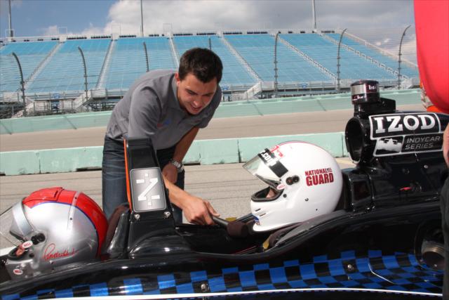Graham Rahal wishes luck to Beatriz Recari before her ride with Mario Andretti. -- Photo by: Chris Jones