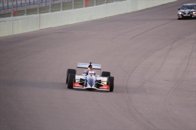 Mario Andretti driving the IndyCar two-seater. -- Photo by: Ron McQueeney