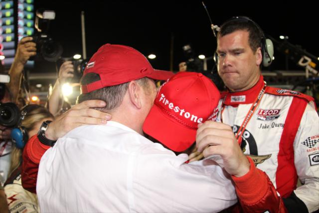 An embrace for both Chip Ganassi and Dario Franchitti. -- Photo by: Ron McQueeney