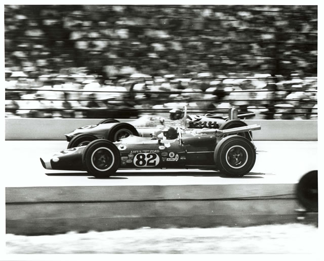 Jim Clark, #82, Lotus powered by Ford, Lotus, Ford races with Len Sutton, #16, Bryant Heating & Cooling, Vollstedt, Ford during 1965 Indianapolis 500. -- Photo by: No Photographer