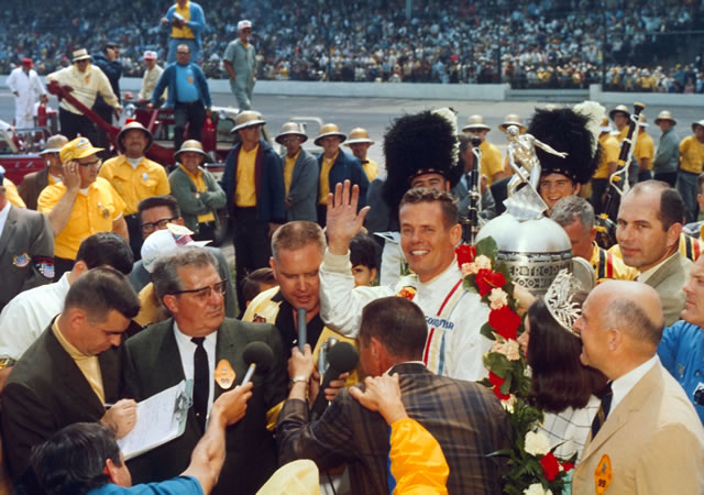 1968 Indianapolis 500 winner Bobby Unser with crew in victory lane. -- Photo by: No Photographer
