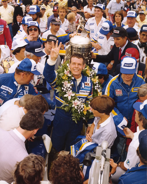 1981 Indianapolis 500 winner Bobby Unser celebrating with crew in victory lane. -- Photo by: No Photographer