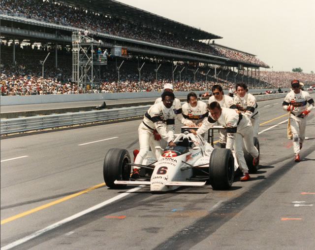 Michael Andretti, #6, Kmart/Havoline, Lola, Chevrolet Indy being pushed by crew in the pits. -- Photo by: No Photographer
