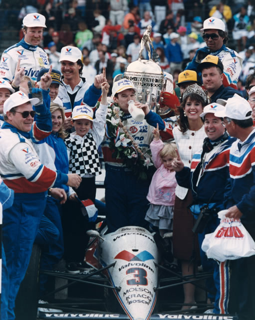Al Unser Jr. celebrates his first of two Indianapolis 500 victories. The ..043 sec. margin of victory is the closest in the history of the race. -- Photo by: No Photographer