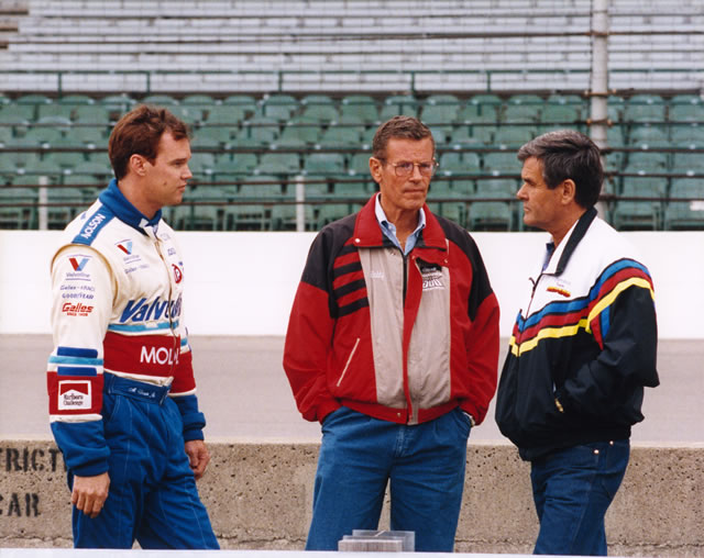 Al Unser Jr, (left) with father Al Unser Sr. (right) and uncle Bobby Unser (center) in the pits at the Indianapolis Motor Speedway in 1992. -- Photo by: No Photographer