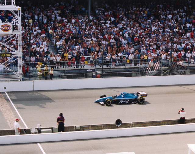 Eddie Cheever Jr., #51, driver of the Rachel's Potato Chips, Dallara, Oldsmobile Aurora, approaches the Yard of Bricks for victory in the 1998 Indianapolis 500. -- Photo by: No Photographer