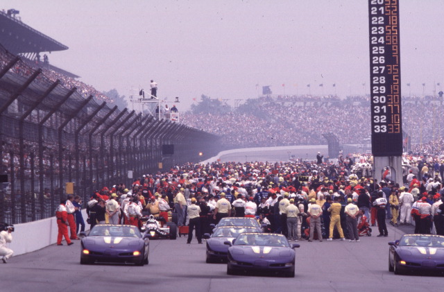 Cars are lined up behind the Chevrolet Corvette pace vehicles prior to the start of the 1998 Indianapolis 500. -- Photo by: No Photographer