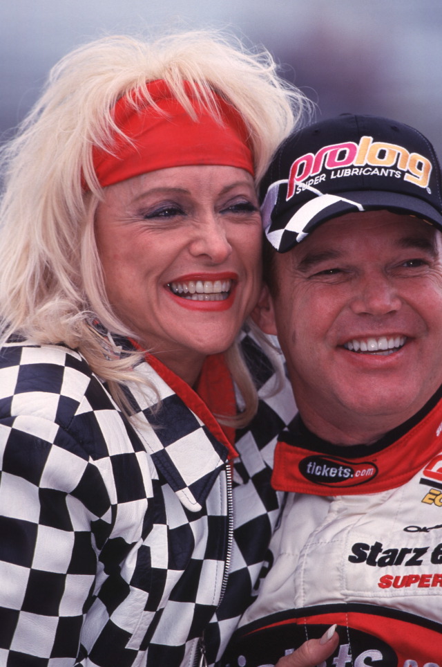 Two-time Indianapolis 500 champion Al Unser Jr. alongside Linda Vaughn. -- Photo by: No Photographer