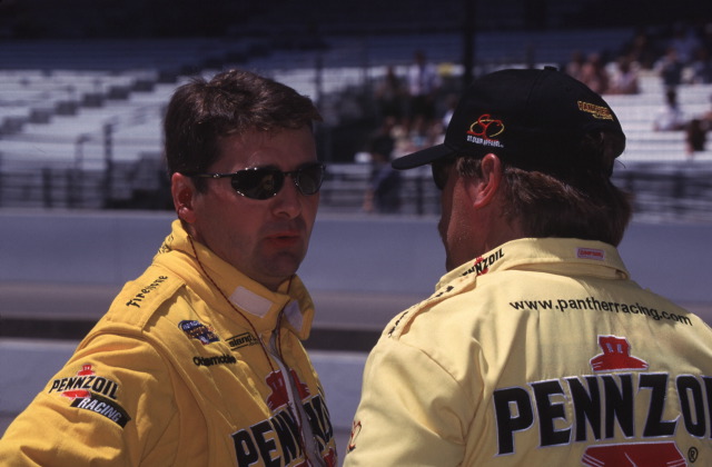 Scott Goodyear, driver of the #4 Pennzoil Panther Dallara, Dallara, Oldsmobile speaks with a crew member. -- Photo by: No Photographer