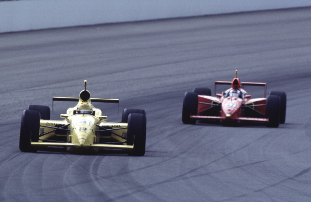 Scott Goodyear in the #4 Pennzoil Panther Dallara, Dallara, Oldsmobile passes Jimmy Kite,  in the #27 Big Daddy's BBQ/Founders Bank/Blueprint Racing Spl., G Force, Oldsmobile. -- Photo by: No Photographer