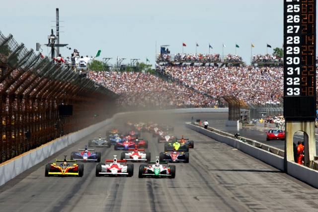 The green flag waves to begin the 89th running of the Indianapolis 500 at the Indianapolis Motor Speedway. -- Photo by: Dan Helrigel