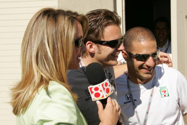 Andretti Green Racing drivers Dan Wheldon, middle, and Tony Kanaan are interviewed before the 89th running of the Indianapolis 500 at the indianapolis Motor Speedway.  -- Photo by: Michael Voorhees