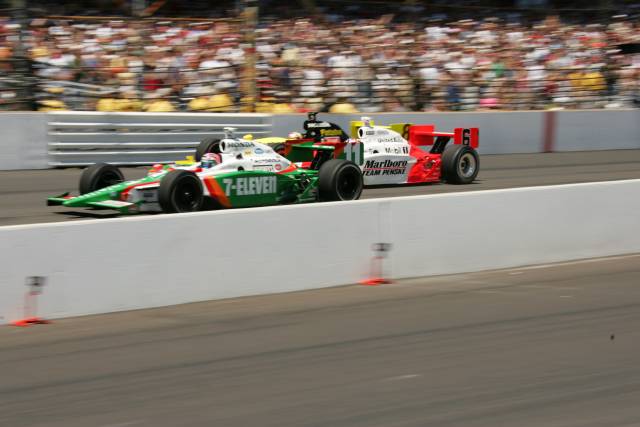 Tony Kanaan in the #11 Team 7-Eleven Dallara/Honda leads Sam Hornish, Jr. in the #6 Marlboro Team Penske Dallara/Toyota and Scott Sharp in the #8 Delphi Panoz G-Force/Honda during the start of the 89th running of the Indianapolis 500 at the Indianapolis Motor Speedway.  -- Photo by: Michael Voorhees