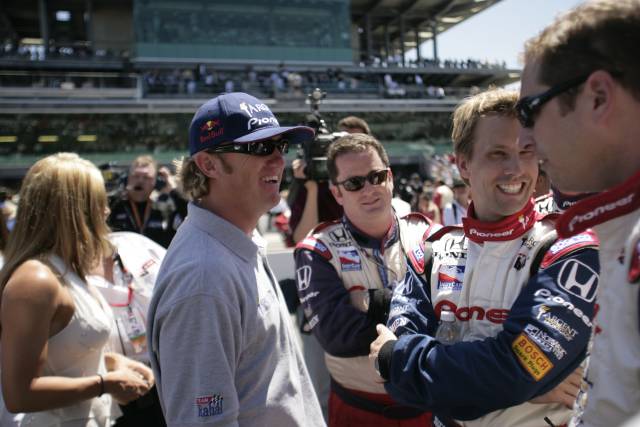 2004 Indy 500 winner Buddy Rice chats with 1999 winner Kenny Brack before the 89th running of the Indianapolis 500 at the Indianapolis Motor Speedway. -- Photo by: Michael Voorhees
