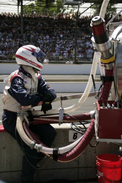 A Rahal Letterman Racing crewman waits to service a car in the pits during the 89th running of the Indianapolis 500 at the Indianapolis Motor Speedway. -- Photo by: Michael Voorhees