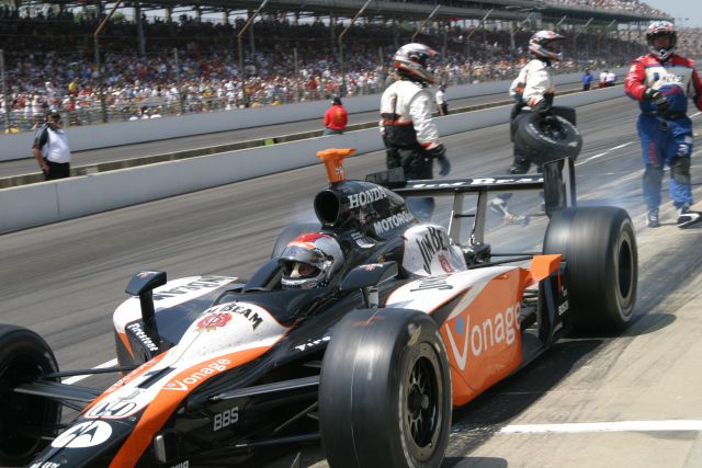 Michael Andretti in the No. 1 Jim Beam/Vonage car leaves the pits during the 90th running of the Indianapolis 500. -- Photo by: Chris Jones