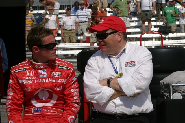 Scott Dixon, left, talks to Target Chip Ganassi Racing team owner Chip Ganassi, right. Scott drives the No. 9 car. -- Photo by: Chris Jones