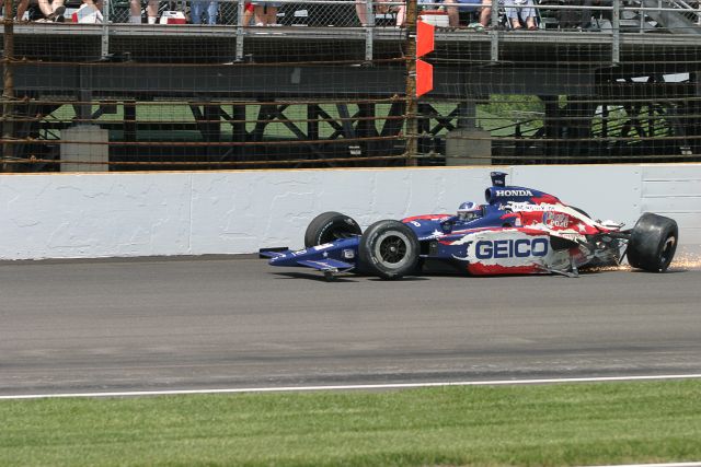 Al Unser Jr.'s car slides after he made impact with the safety wall during the 90th running of the Indianapolis 500. -- Photo by: Richard Dowdy