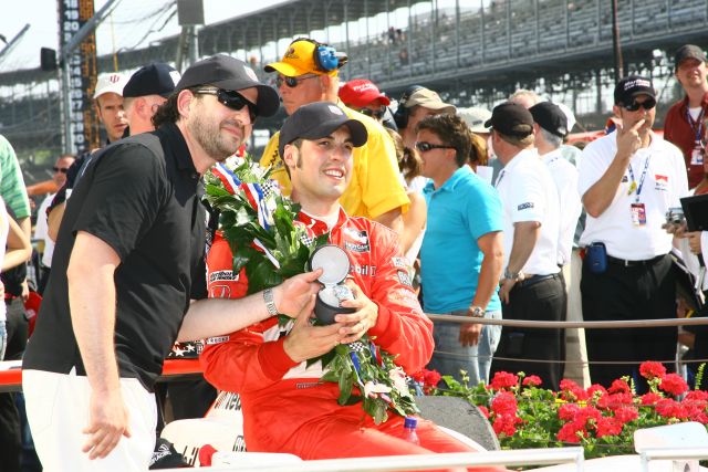 Sam Hornish Jr. accepts his victory Tag Heuer watch after winning the 90th running of the Indianapolis 500. -- Photo by: Shawn Payne