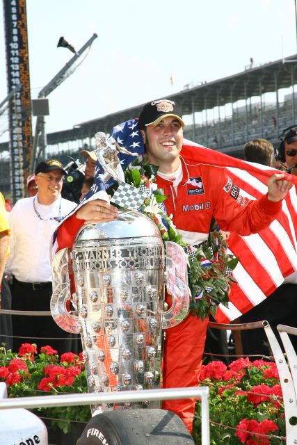 Sam Hornish Jr. poses with the world-famous Borg-Warner Indianapolis 500 trophy after winning the 90th running of the Indianapolis 500. -- Photo by: Shawn Payne