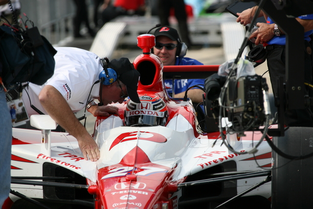 No. 27 Hideki Mutoh gets a few words from Brian Barnhart before qualifications on Pole Day at the Indianapolis Motor Speedway. -- Photo by: Chris Jones
