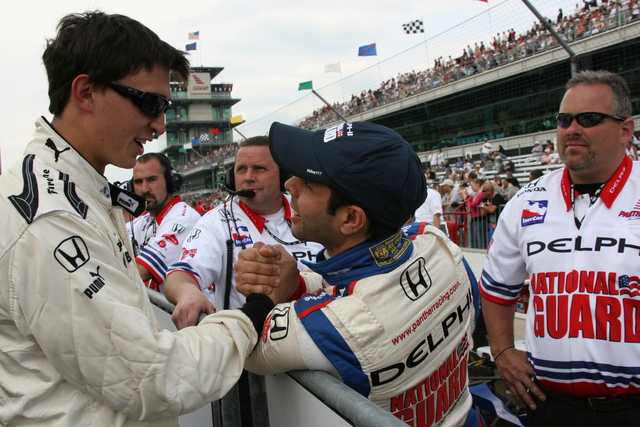 Vitor Meira congratulates Graham Rahal during qualifications on Pole Day at the Indianapolis Motor Speedway. -- Photo by: Chris Jones
