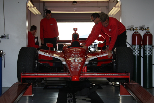 Dan Wheldon's car going through inspection on the morning of Pole Day quals. -- Photo by: Dana Garrett