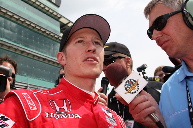 Ryan Briscoe gets interviewed during qualifications on Pole Day at the Indianapolis Motor Speedway. -- Photo by: Dana Garrett