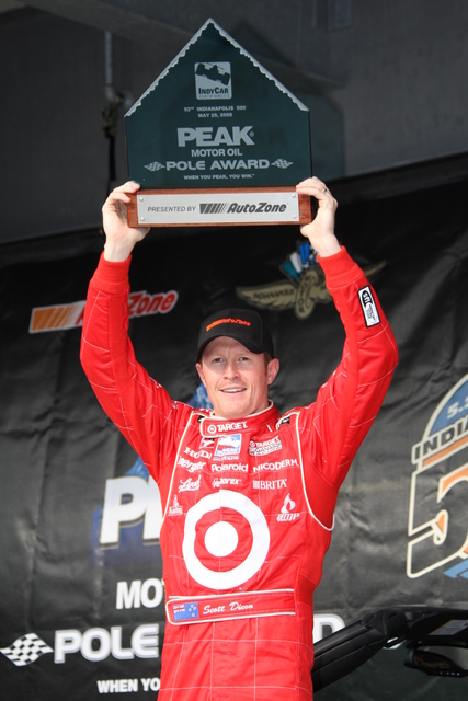 PEAK Motor Oil Pole Award winner Scott Dixon hold his trophy high after qualifications on Pole Day at the Indianapolis Motor Speedway. -- Photo by: Dana Garrett